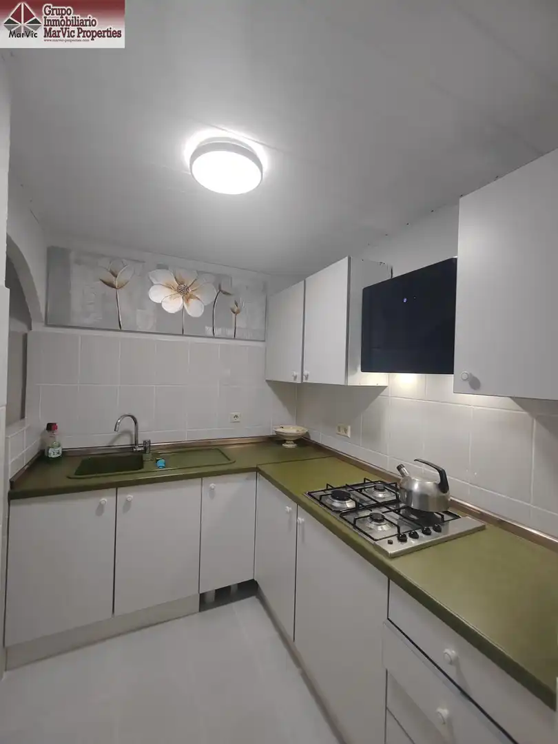 Kitchen of Apartments for sale in Benidorm  with Air Conditioner, Private garden and Furnished