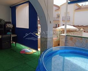 Swimming pool of Single-family semi-detached for sale in Nerja  with Air Conditioner and Terrace