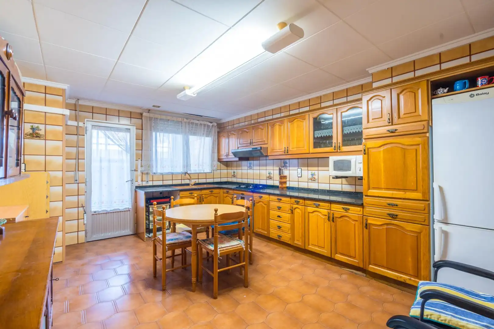 Cocina de Casa adosada en venta en Sagunto / Sagunt con Terraza
