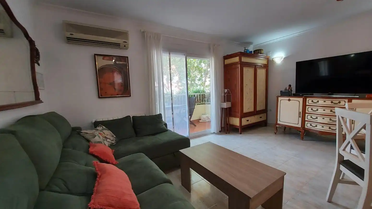 Sala d'estar de Casa adosada en venda en Sagunto / Sagunt amb Calefacció i Terrassa