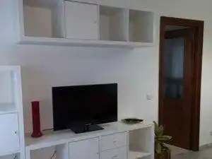 Sala d'estar de Pis de lloguer en Sevilla amb Aire condicionat, Jardí privat i Moblat
