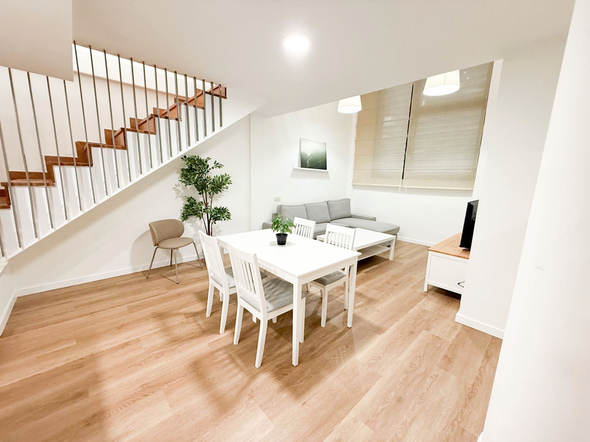 Sala d'estar de Dúplex de lloguer en  Barcelona Capital amb Aire condicionat, Calefacció i Parquet