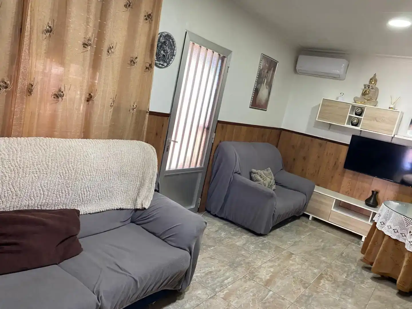 Sala d'estar de Casa adosada en venda en Puertollano amb Aire condicionat
