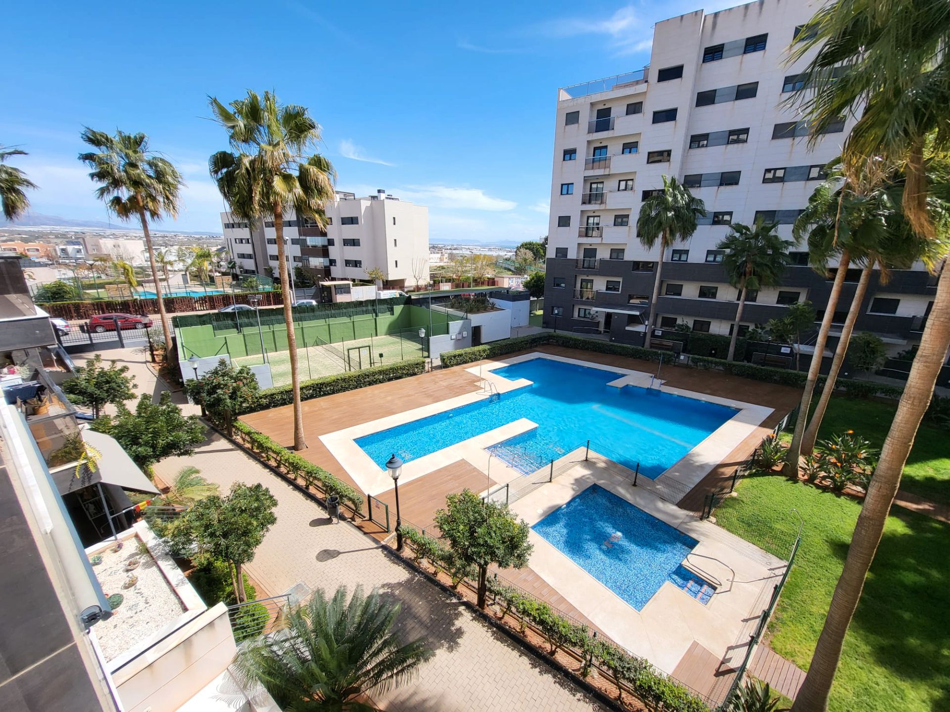 Swimming pool of Flat for sale in  Almería Capital  with Air Conditioner, Heating and Parquet flooring