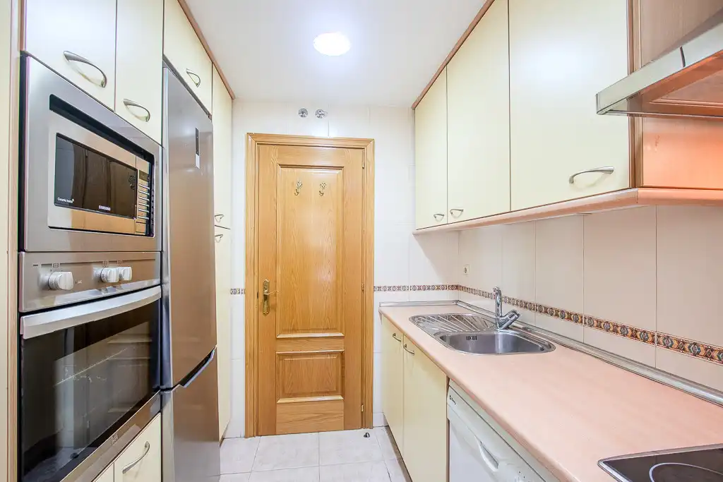 Kitchen of Flat for rent in Madrid  with Air Conditioner, Private garden and Storage room