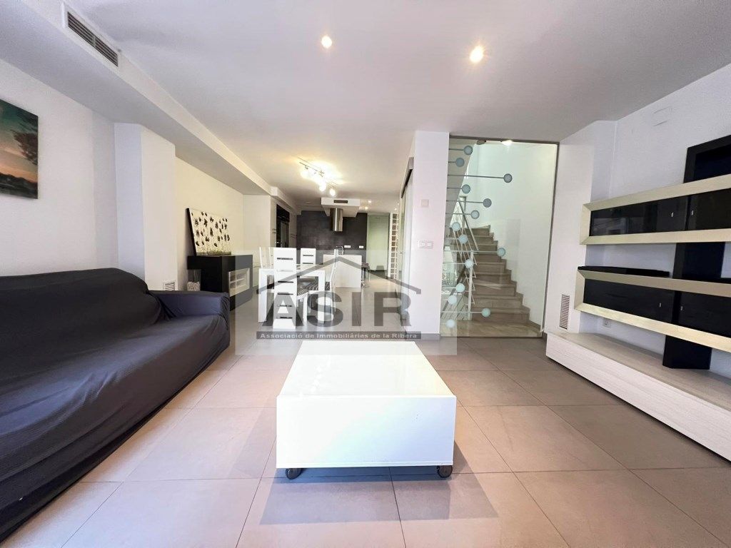 Sala d'estar de Casa o xalet en venda en Alzira amb Aire condicionat i Terrassa