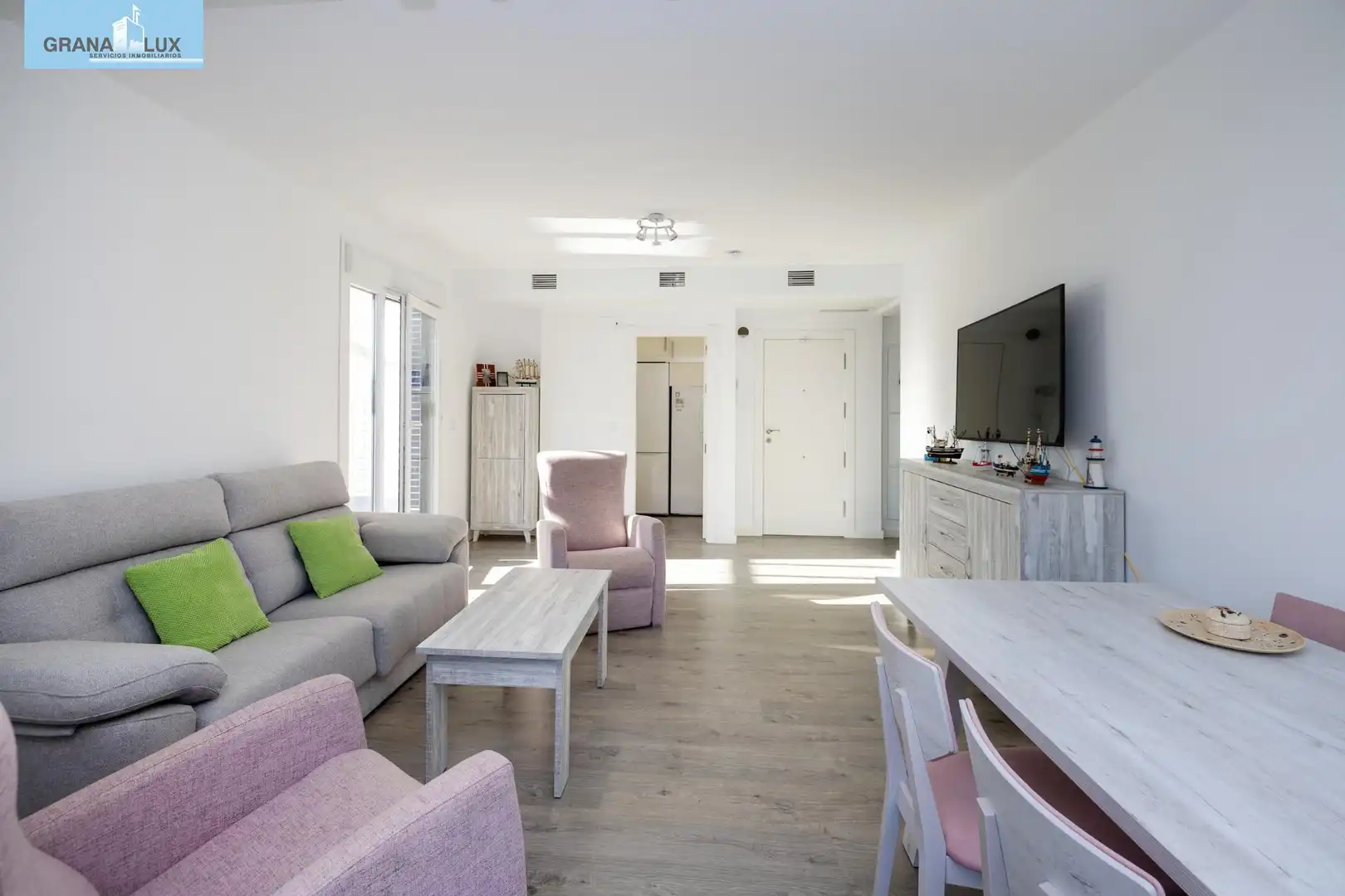 Sala de estar de Piso en venta en Almuñécar con Aire acondicionado, Jardín privado y Terraza