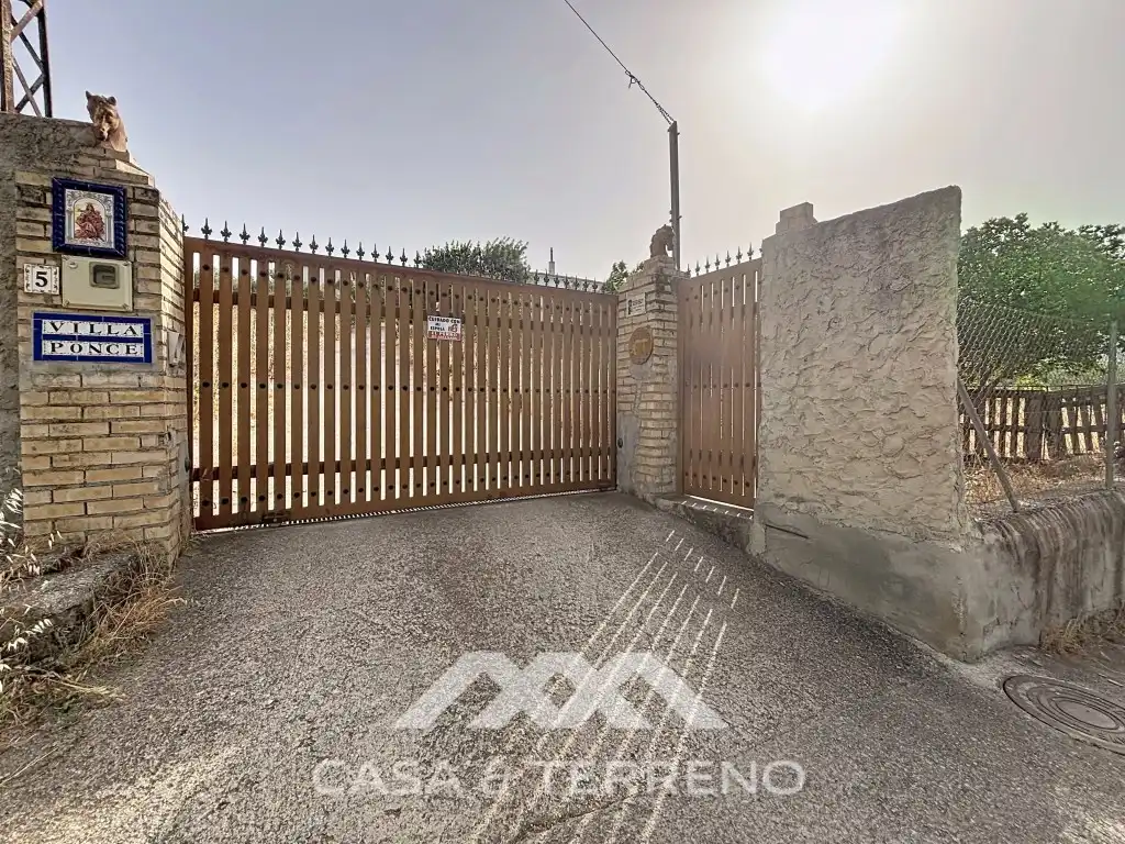 Aparcament de Casa o xalet en venda en El Burgo amb Aire condicionat, Jardí privat i Moblat