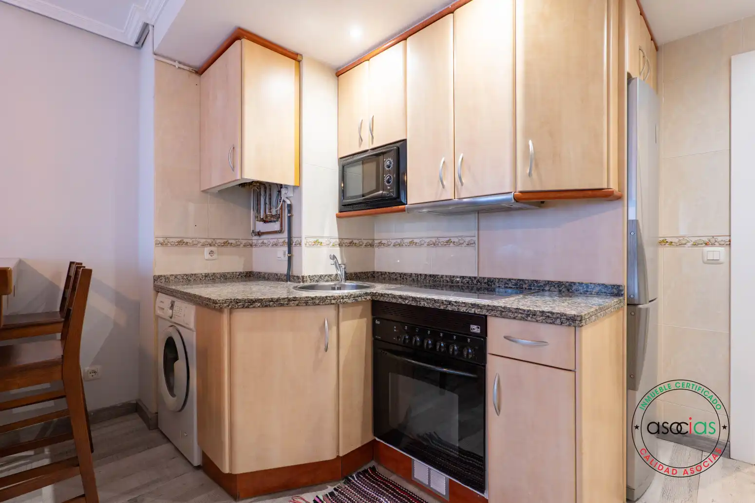 Kitchen of Flat for sale in Gijón   with Heating and Storage room