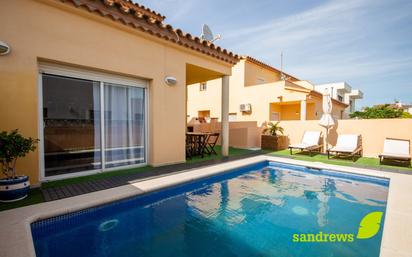 Swimming pool of Single-family semi-detached for sale in Empuriabrava  with Air Conditioner, Terrace and Swimming Pool