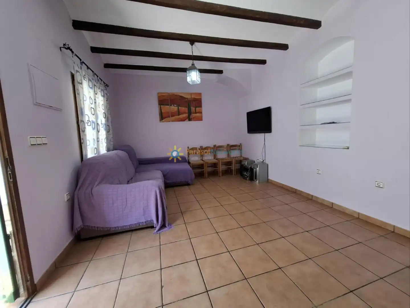 Sala d'estar de Casa adosada en venda en Oliva amb Aire condicionat i Terrassa
