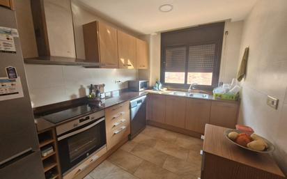 Kitchen of Duplex for sale in Llagostera  with Air Conditioner, Heating and Oven