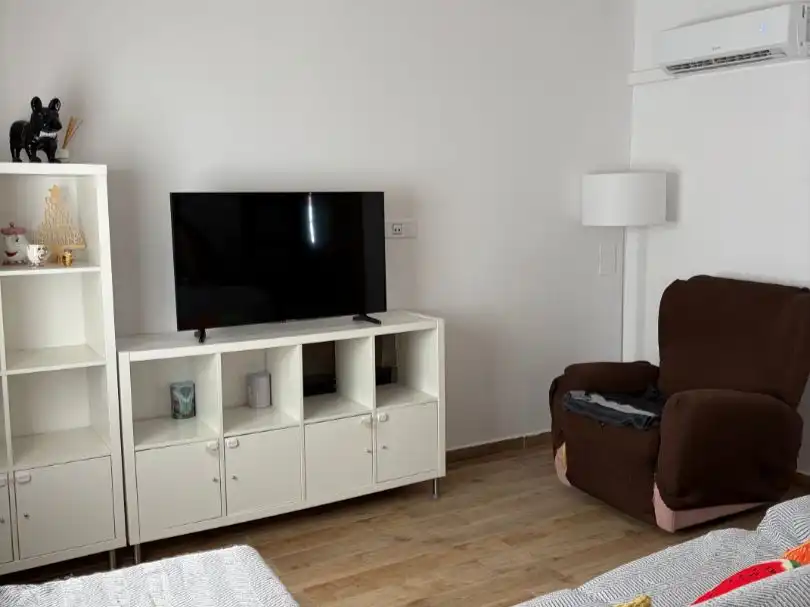 Sala d'estar de Casa o xalet en venda en Carmona amb Aire condicionat, Jardí privat i Terrassa