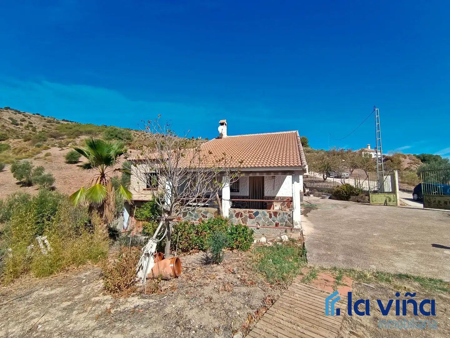 Vista exterior de Casa o xalet en venda en El Burgo amb Traster, Piscina i Moblat