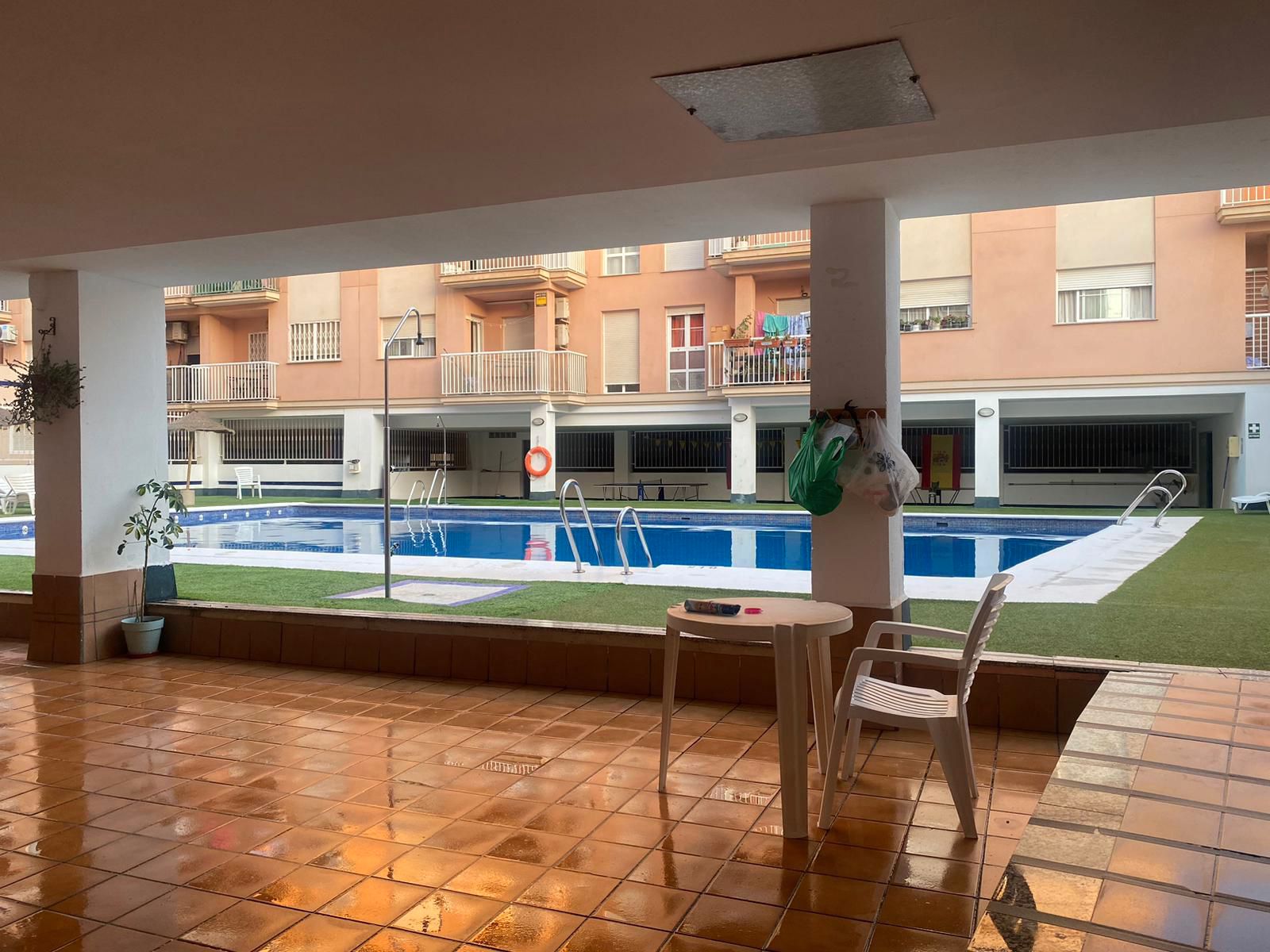 Swimming pool of Flat for sale in Roquetas de Mar  with Air Conditioner, Heating and Private garden