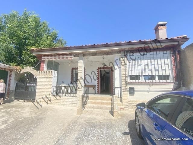 Vista exterior de Casa o xalet en venda en El Busto amb Calefacció, Jardí privat i Piscina