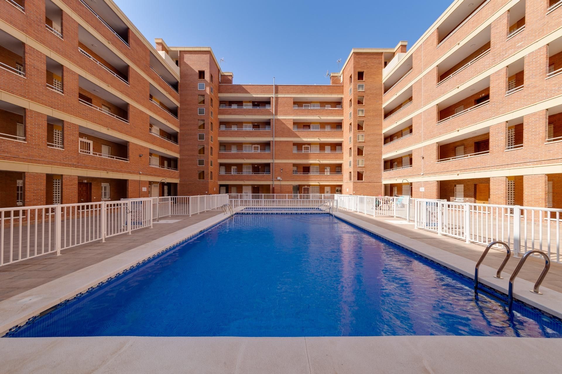 Swimming pool of Apartment for sale in Torrevieja  with Air Conditioner, Terrace and Balcony