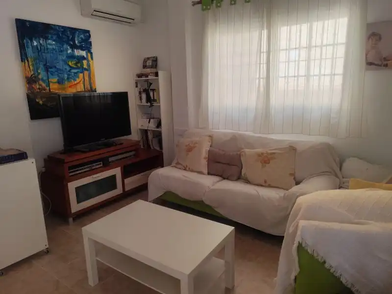 Sala de estar de Casa adosada en venta en Cullera con Aire acondicionado, Calefacción y Terraza