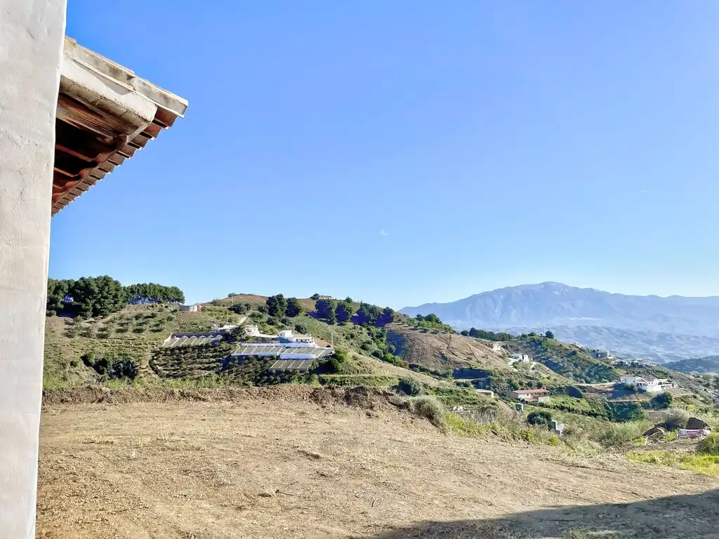 Casa rústica amb piscina en venda a El Borge, imagen 2