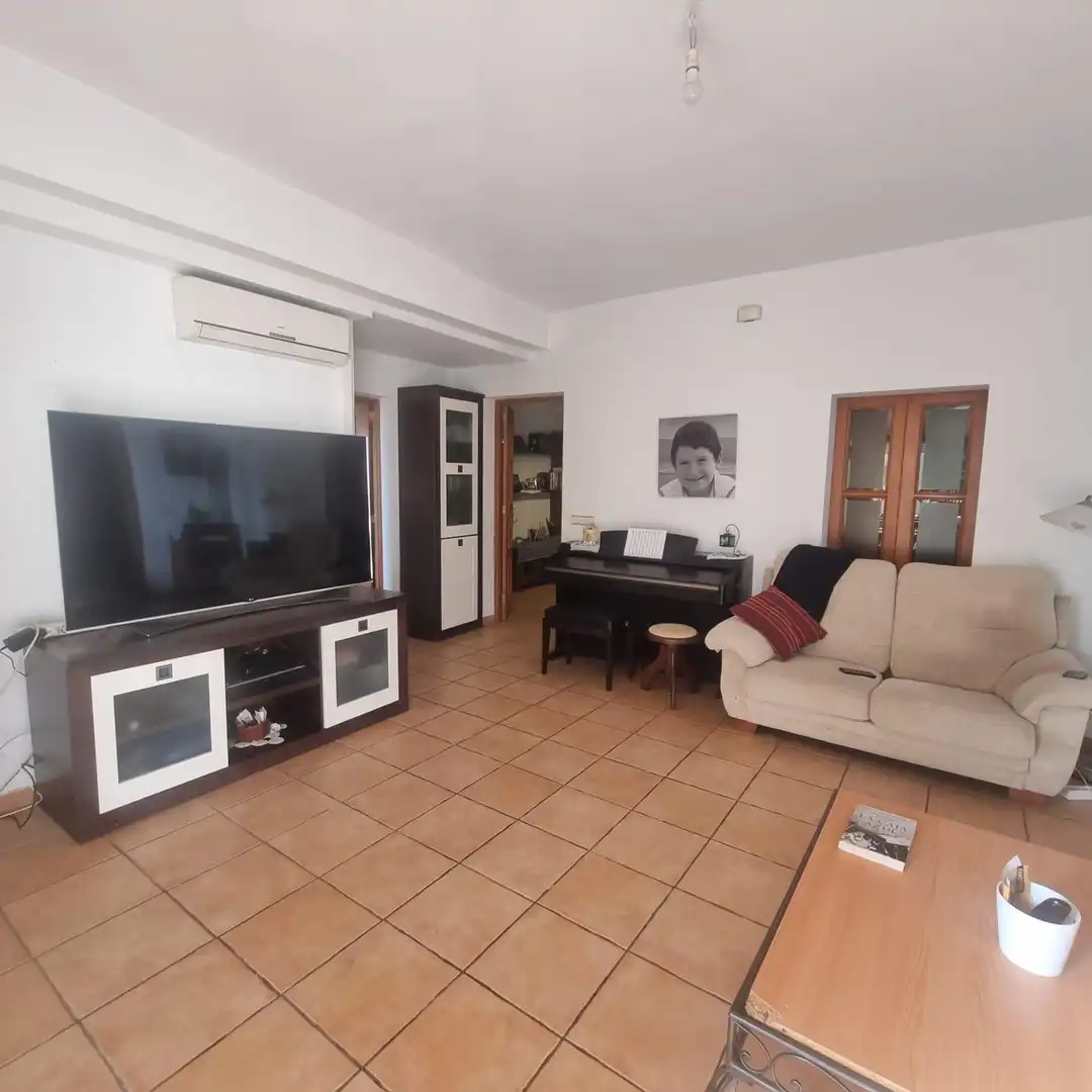 Sala d'estar de Planta baixa en venda en Marratxí amb Aire condicionat, Jardí privat i Terrassa