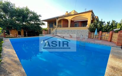 Swimming pool of House or chalet for sale in Alzira  with Air Conditioner, Terrace and Swimming Pool