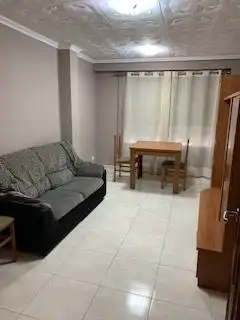 Sala d'estar de Casa adosada en venda en Sueca amb Terrassa, Moblat i Rentadora