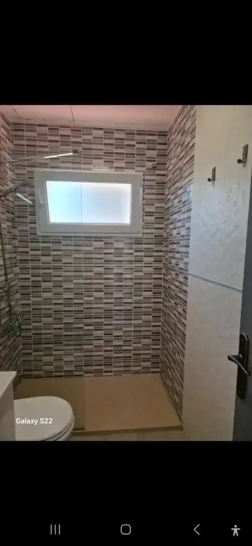 Bany de Casa adosada en venda en L'Ametlla de Mar  amb Aire condicionat, Jardí privat i Parquet