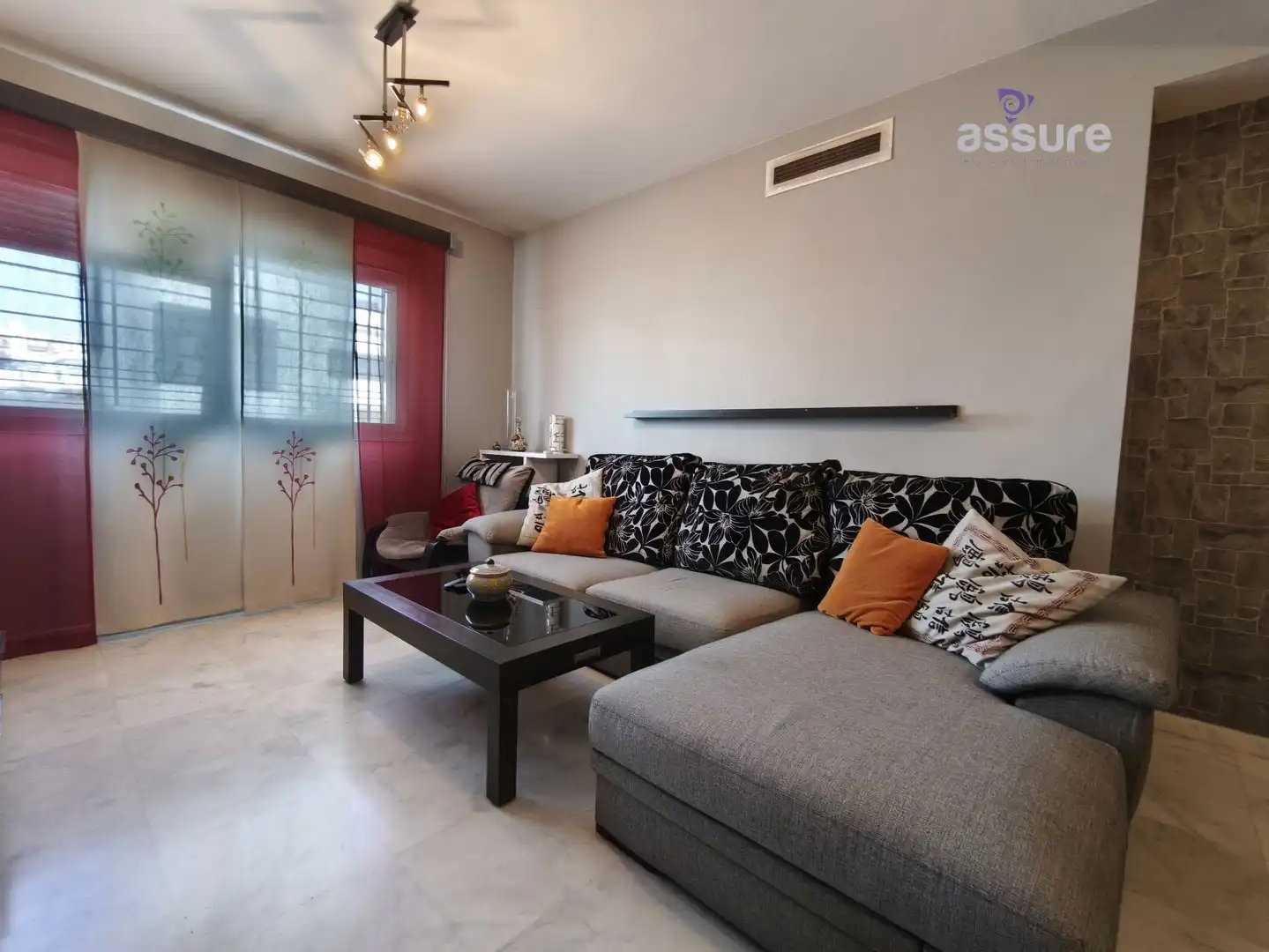 Sala de estar de Casa adosada en venta en Huelva con Aire acondicionado, Calefacción y Jardín privado