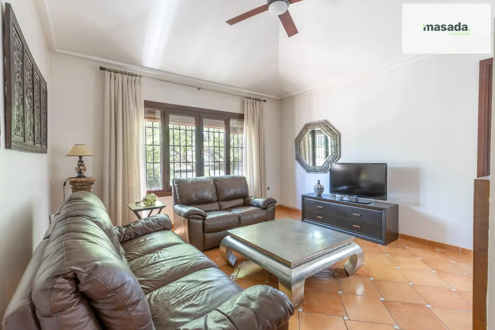 Sala de estar de Casa o chalet en venta en Vegas del Genil con Jardín privado, Piscina y Alarma