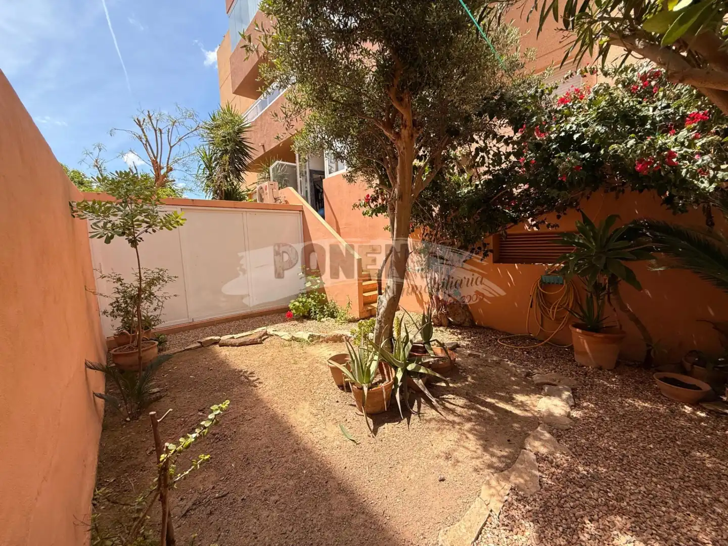 Garten von Erdgeschoss zum Verkauf in Santa Eulària des Riu mit Klimaanlage, Terrasse und Abstellraum