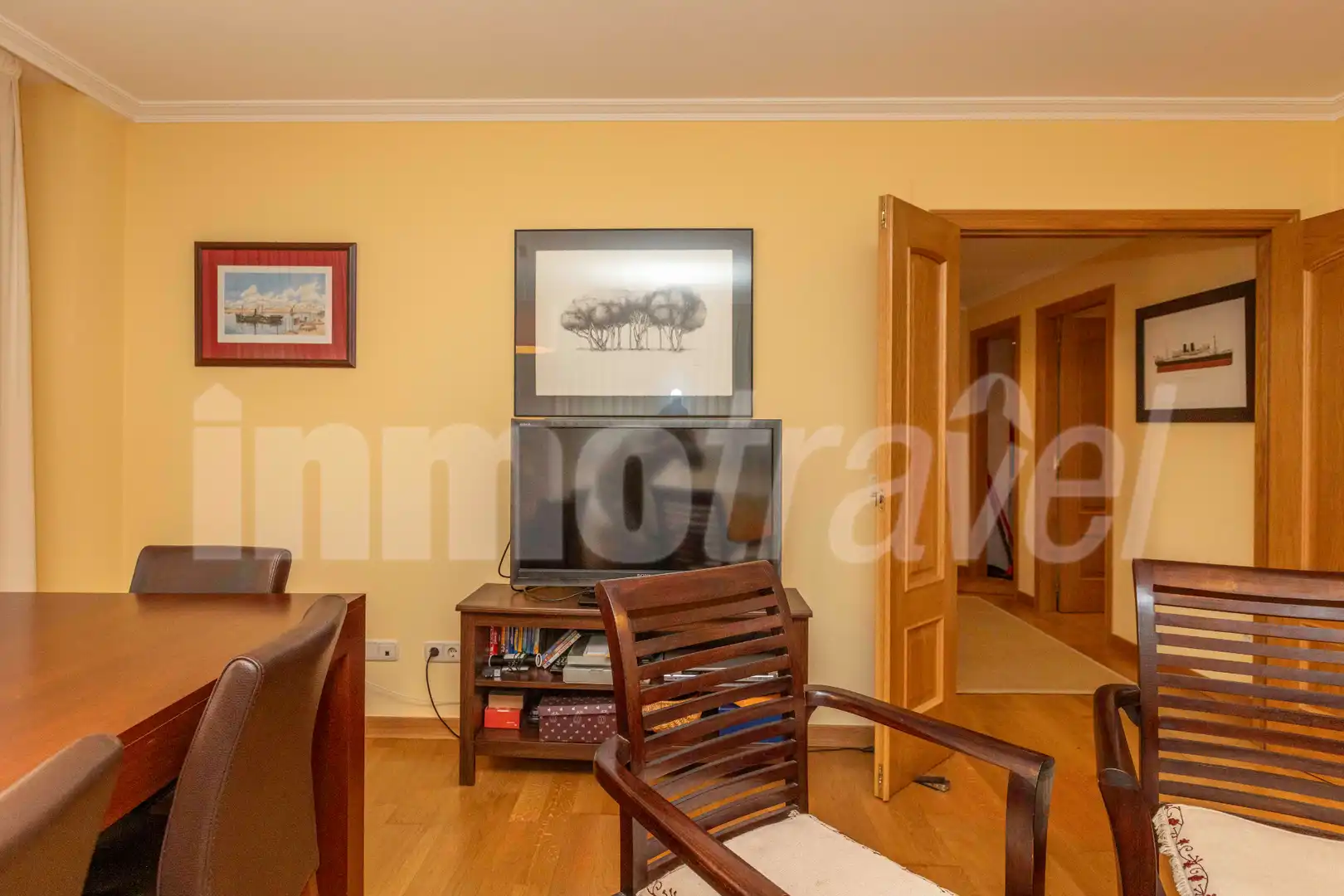 Sala de estar de Apartamento en venta en Sanxenxo con Parquet, Terraza y Trastero