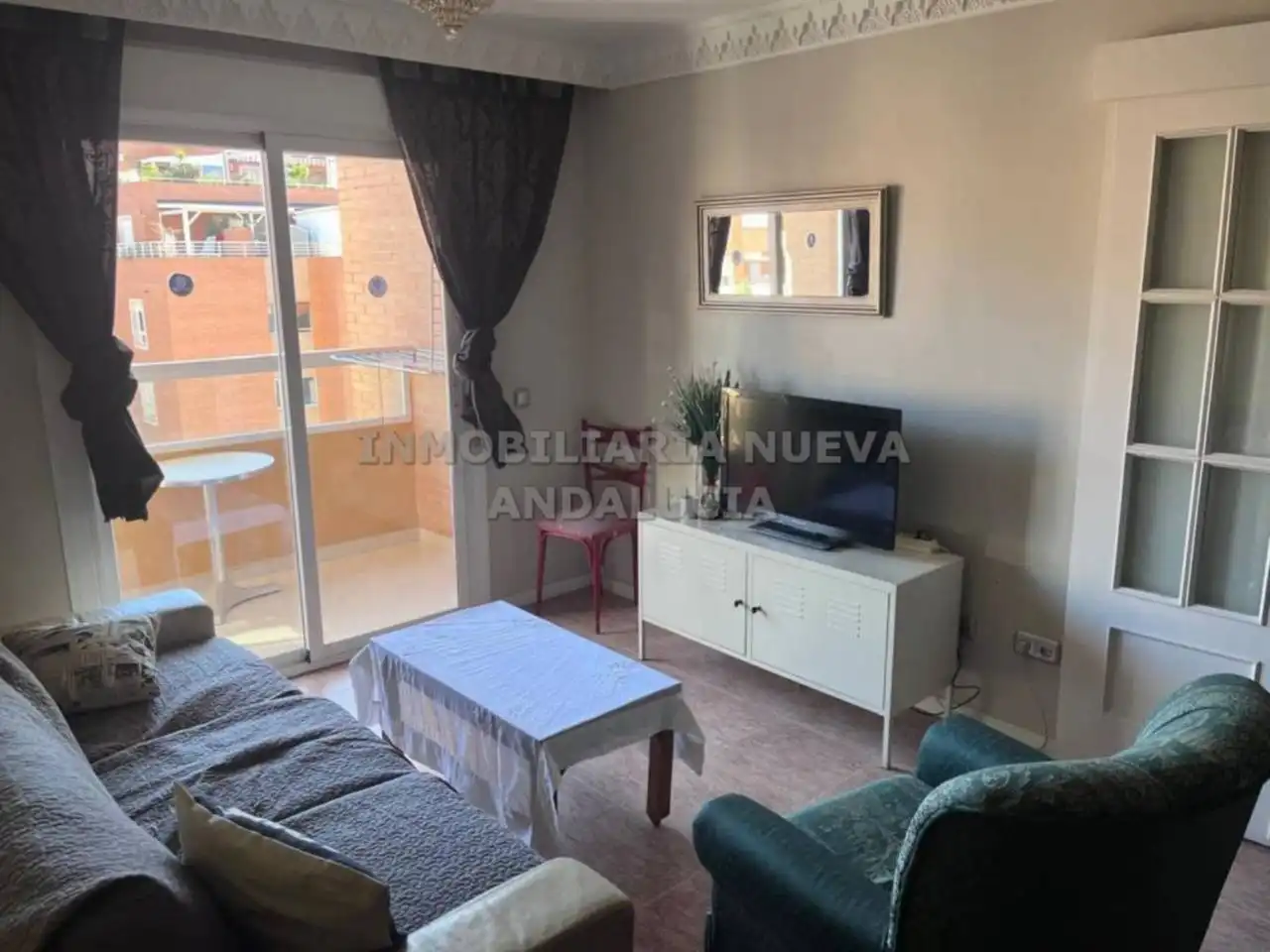 Sala d'estar de Pis de lloguer en Almería amb Aire condicionat, Terrassa i Moblat