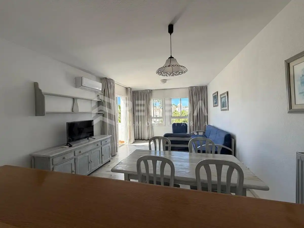 Sala de estar de Apartamento en venta en Roquetas de Mar con Aire acondicionado, Terraza y Piscina comunitaria