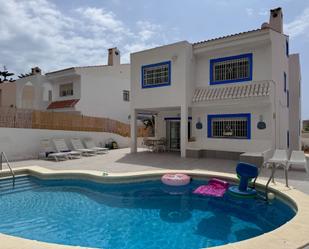 Swimming pool of House or chalet for sale in Roquetas de Mar  with Air Conditioner, Private garden and Storage room