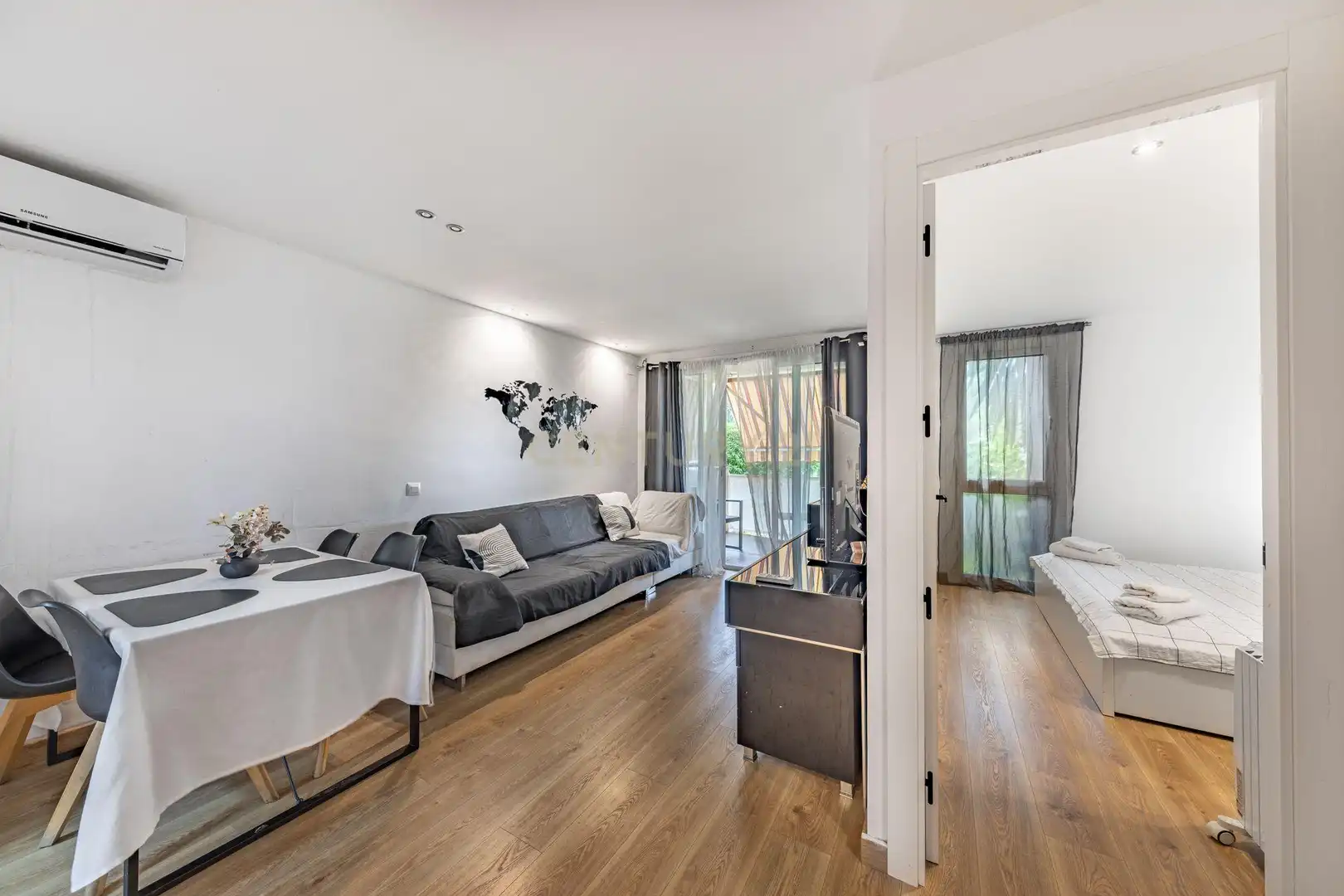 Sala d'estar de Apartament en venda en Sant Pere de Ribes amb Aire condicionat, Jardí privat i Balcó