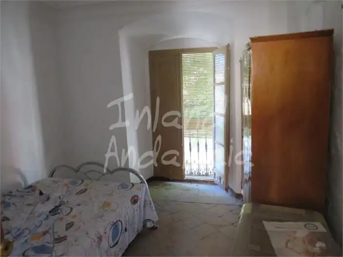 Dormitori de Casa adosada en venda en Santiago de Calatrava amb Terrassa i Traster