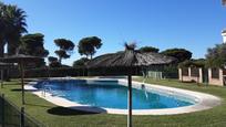 Swimming pool of House or chalet for sale in El Portil  with Private garden and Community pool