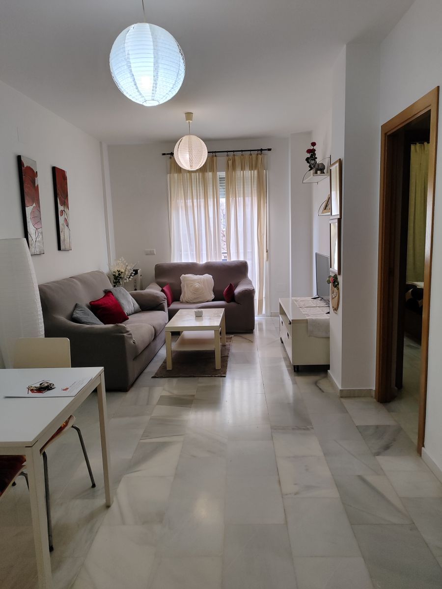 Sala d'estar de Apartament de lloguer en  Huelva Capital amb Aire condicionat, Moblat i Balcó
