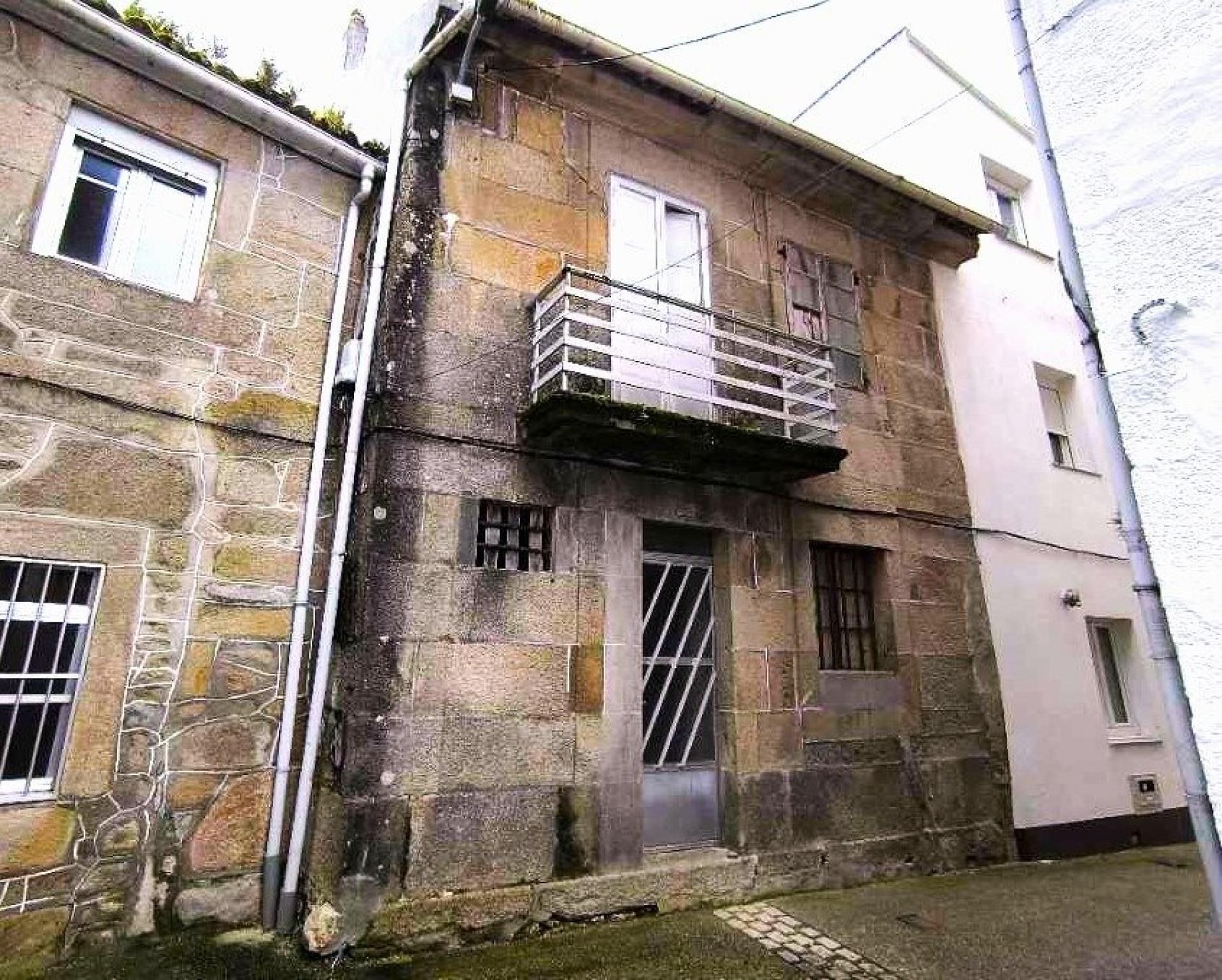 Vista exterior de Casa adosada en venda en Porto do Son amb Balcó