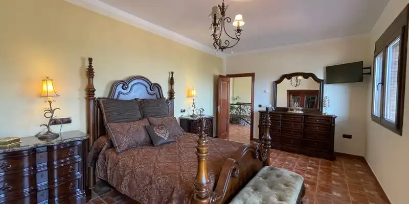 Dormitori de Casa o xalet en venda en Loja amb Aire condicionat, Jardí privat i Terrassa