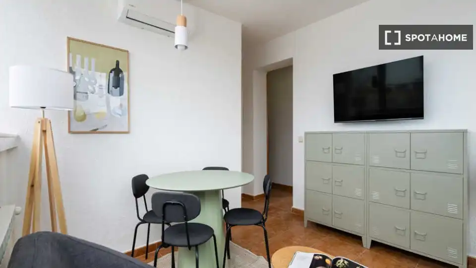 Sala de estar de Piso para compartir en Madrid con Aire acondicionado, Terraza y Amueblado
