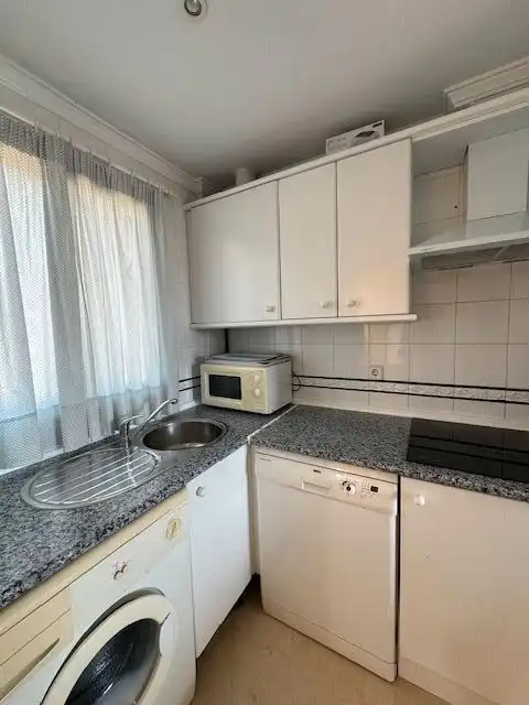 Cuina de Apartament en venda en Chiclana de la Frontera amb Calefacció, Terrassa i Moblat