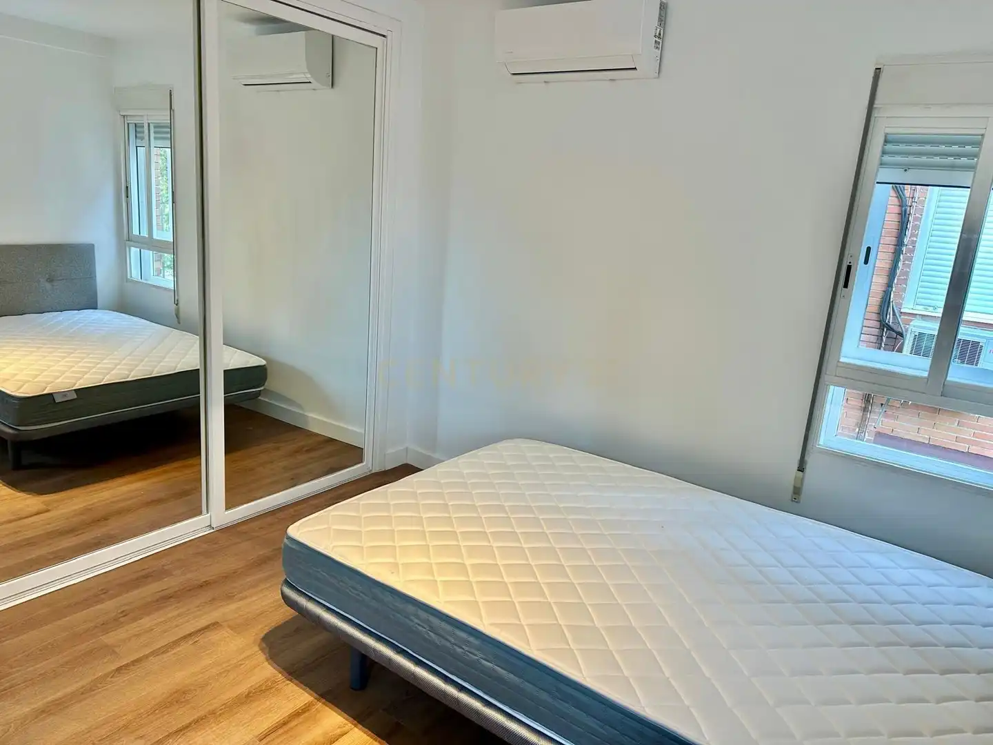 Dormitori de Apartament per a compartir en Madrid amb Aire condicionat, Forn i Rentadora