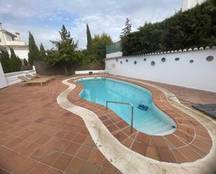 Swimming pool of Single-family semi-detached for sale in La Zubia  with Air Conditioner, Storage room and Furnished