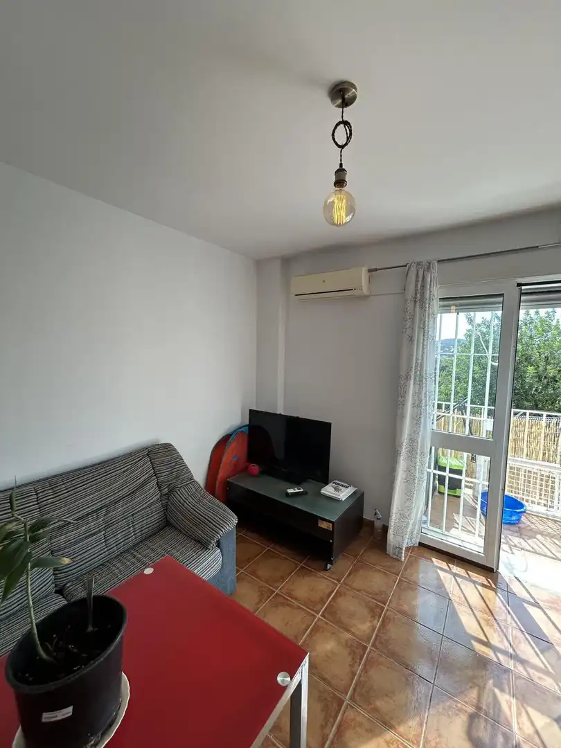 Sala de estar de Estudio de alquiler en El Garrobo, Sevilla