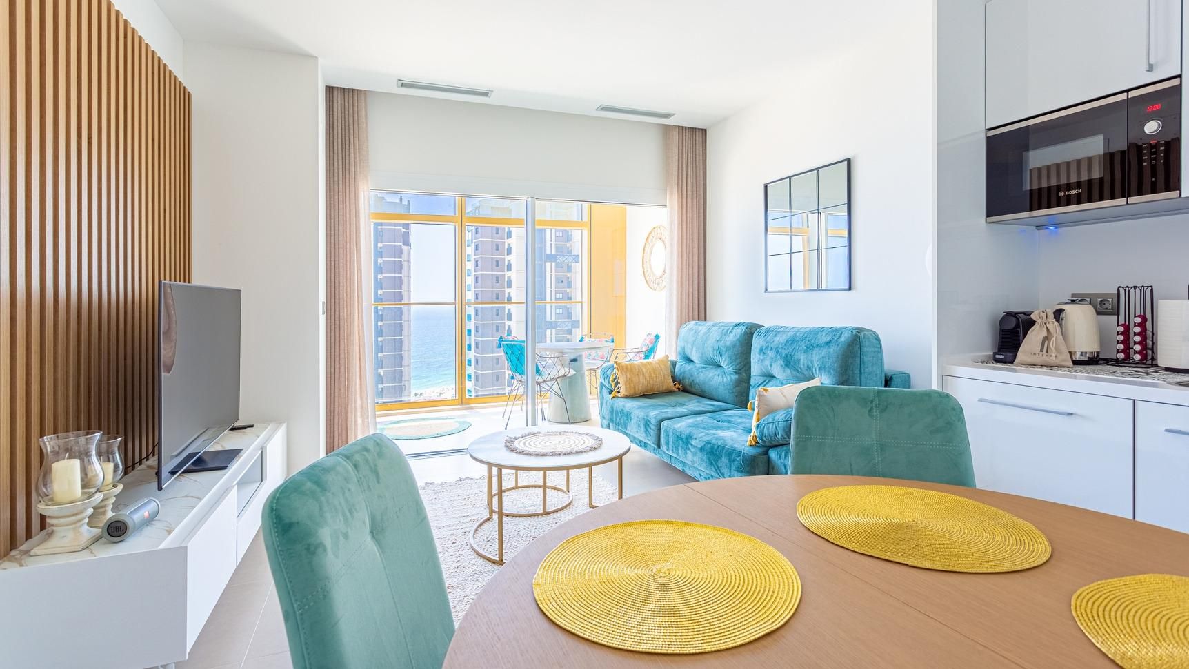Sala d'estar de Apartament en venda en Benidorm amb Aire condicionat, Jardí privat i Terrassa