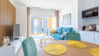 Sala d'estar de Apartament en venda en Benidorm amb Aire condicionat, Jardí privat i Terrassa