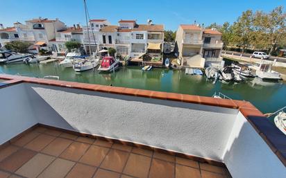 Exterior view of Single-family semi-detached for sale in Empuriabrava  with Air Conditioner, Heating and Terrace