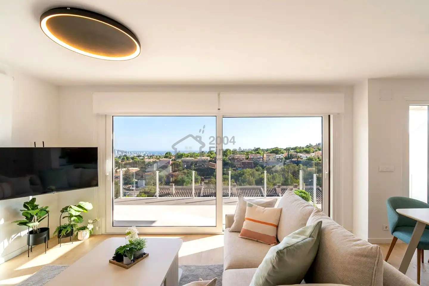 Sala de estar de Casa adosada en venta en La Nucia con Aire acondicionado, Jardín privado y Terraza