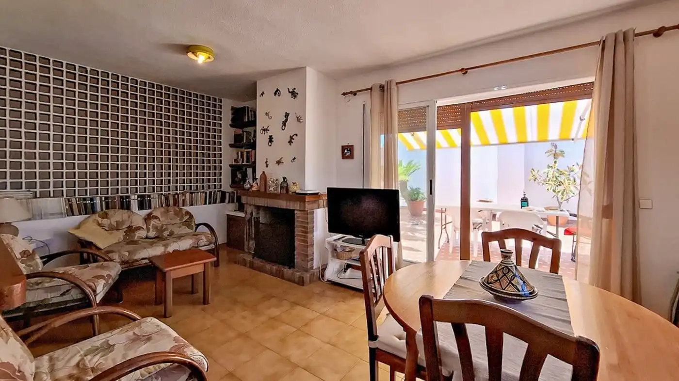 Sala d'estar de Casa adosada en venda en Dénia amb Terrassa, Traster i Piscina